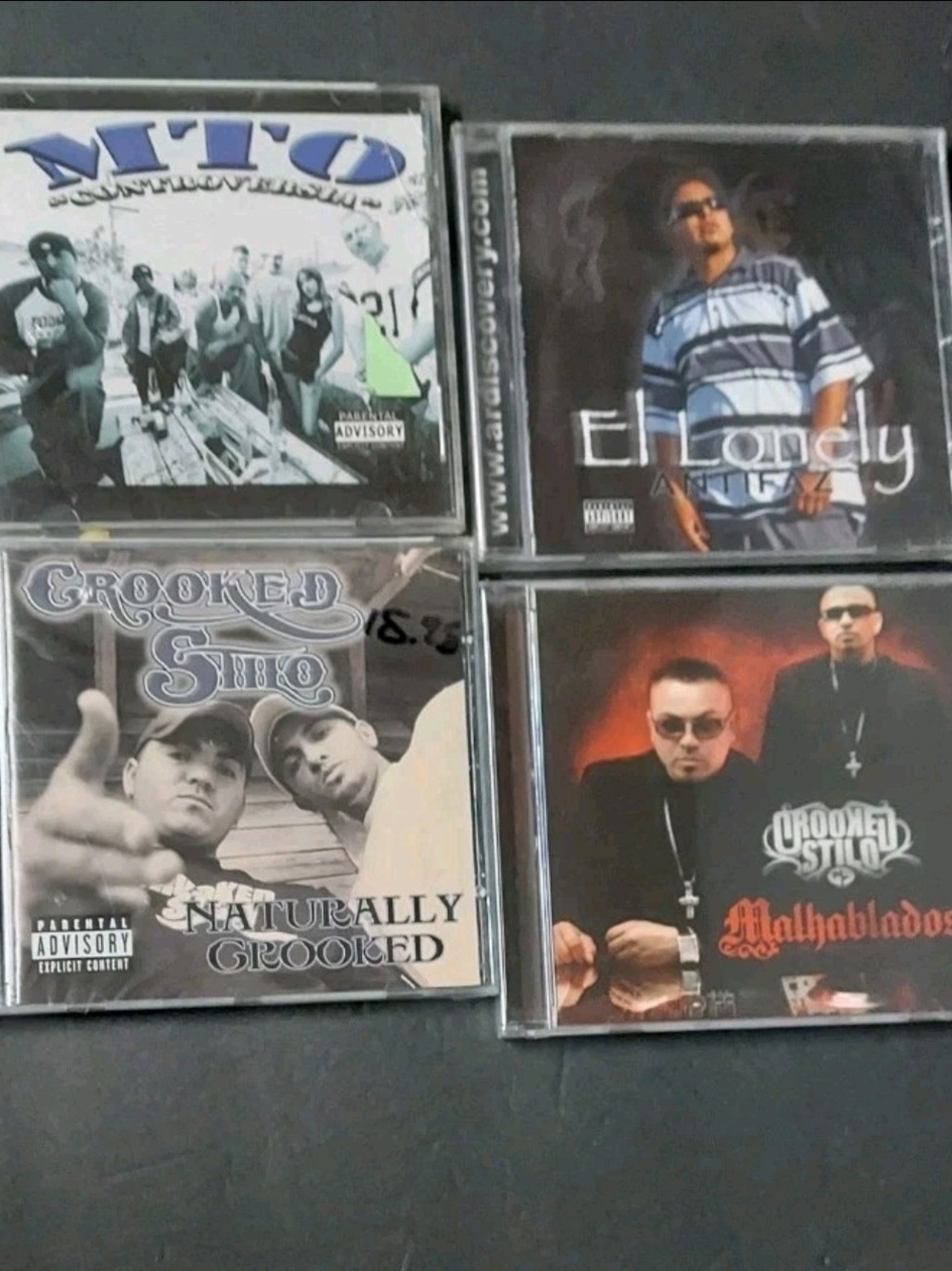 Assorted Crooked Stilo & Latin Hip-Hop CDs - Black